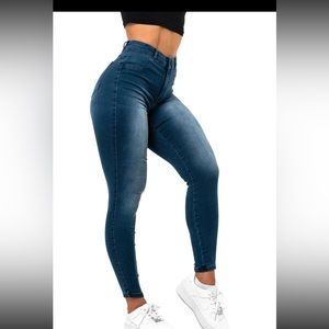 Very stretchy fit jeans! Blue color! Never been worn. Tags still attached!